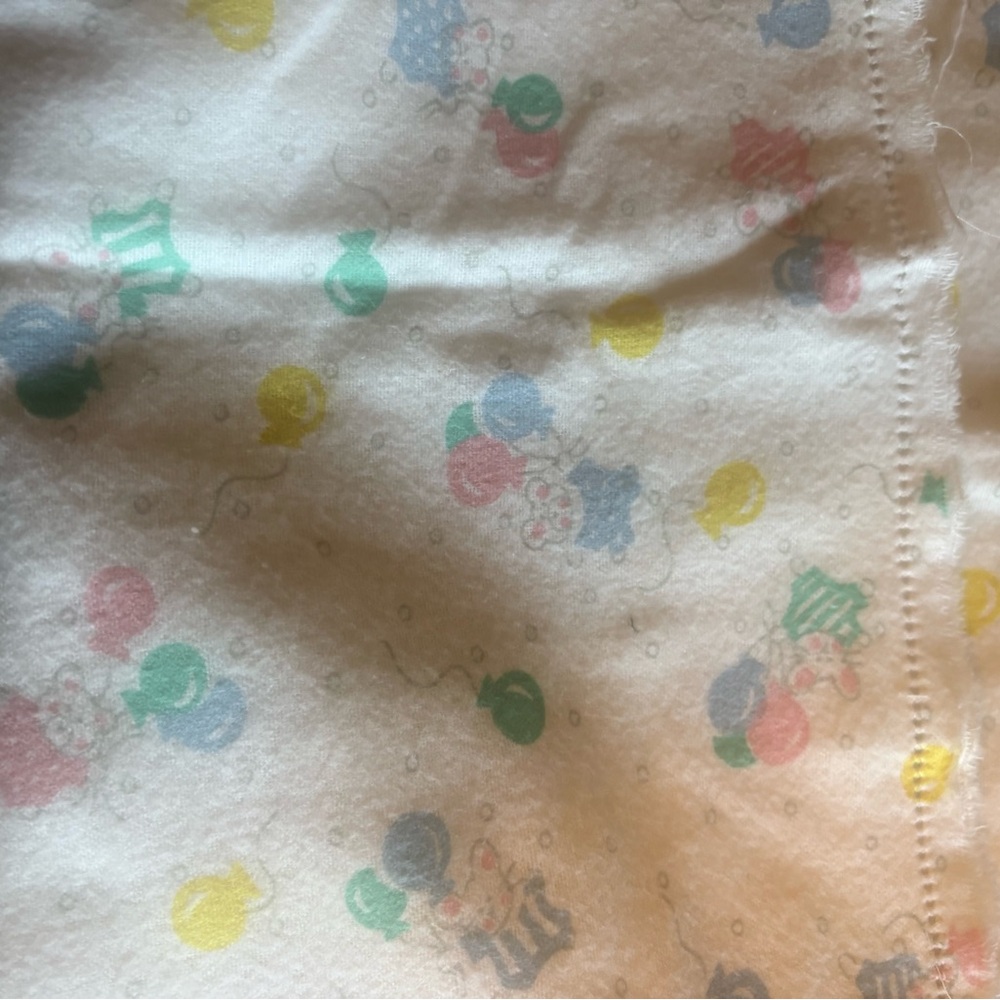 Colorful Balloon and Clown Patterned Fabric with hem stitch around blanket